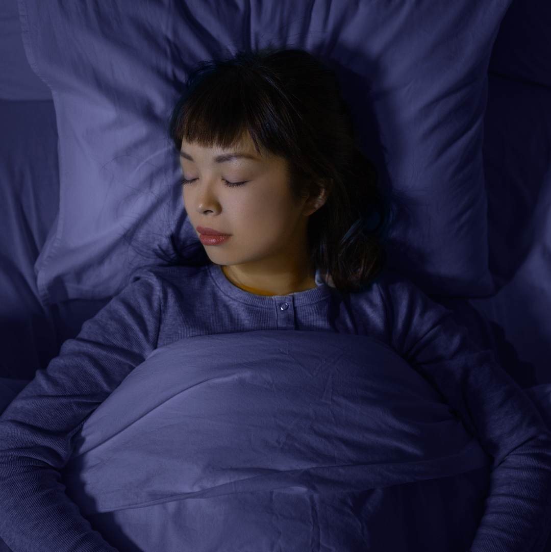 Woman getting great sleep with less anxiety by using hemp derived CBN, CBD and beneficial ingredients.