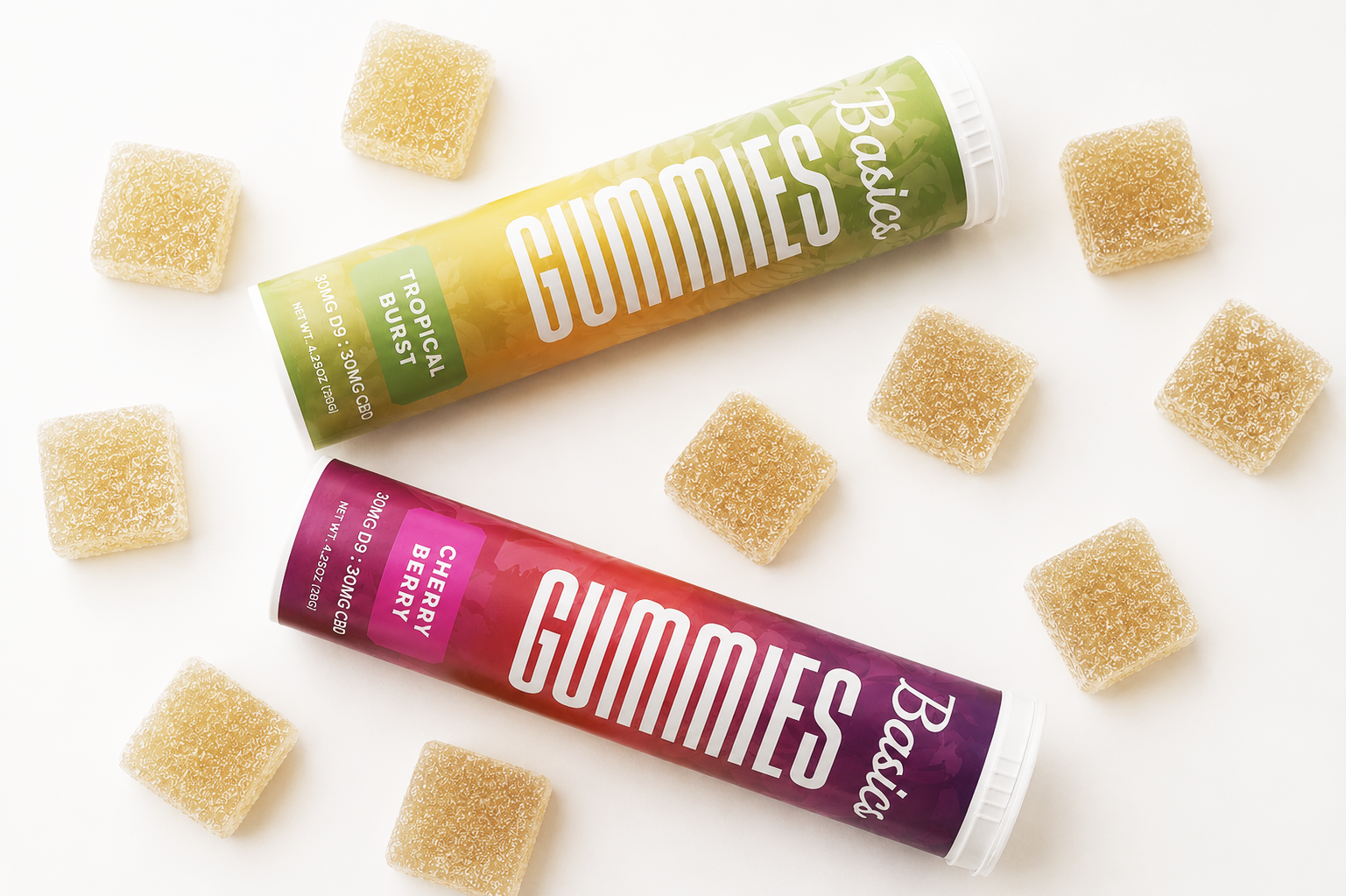 Hands holding Canvas Supply Co. Basics Delta-9 THC gummies in Cherry Berry and Tropical Burst flavors, 1200mg Nano Delta-9 THC gummies.