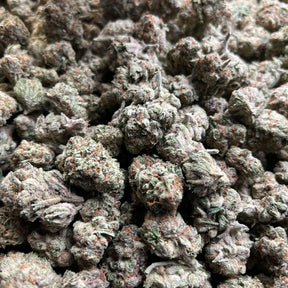 This 36.8% hybrid dazzles with deep purple and forest-green buds coated in shimmering trichomes. Bursting with sweet blueberry and spicy diesel aroma, it delivers a smooth, euphoric lift with a mellow, body-soothing finish.