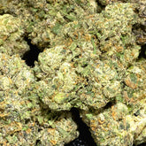 Sex Panther is a heavy-hitting indica with dense, emerald-green buds wrapped in deep purple hues and shimmering trichomes. Its bold aroma mixes sweet berry and pungent gas, delivering deeply calming, couch-lock effects ideal for nighttime relaxation.