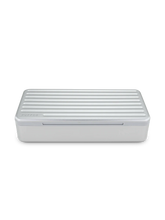 The Travel Case keeps your stash organized. Featuring a ridged hard aluminum exterior with a magnetic lid closure and soft silicone inside to reduce rattling, the Travel Case has room for a Pivot + Hot Knife, up to 3 jars, cotton swabs, a covered section for trash, and anything else you might need.